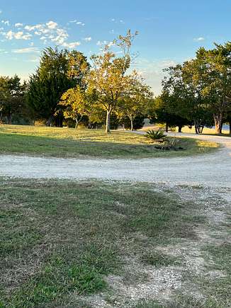 7.8 Acres of Residential Land with Home for Sale in Coldspring, Texas