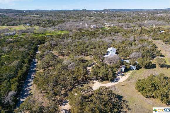 5.8 Acres of Residential Land with Home for Sale in Wimberley, Texas