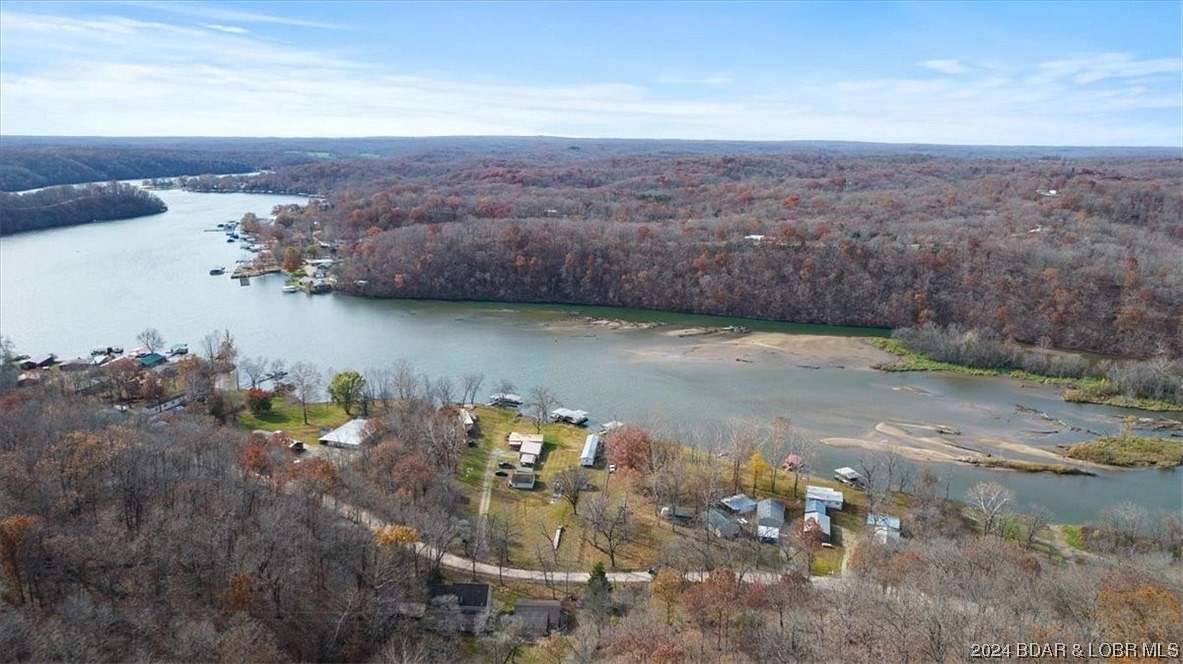 15.1 Acres of Recreational Land with Home for Sale in Versailles, Missouri