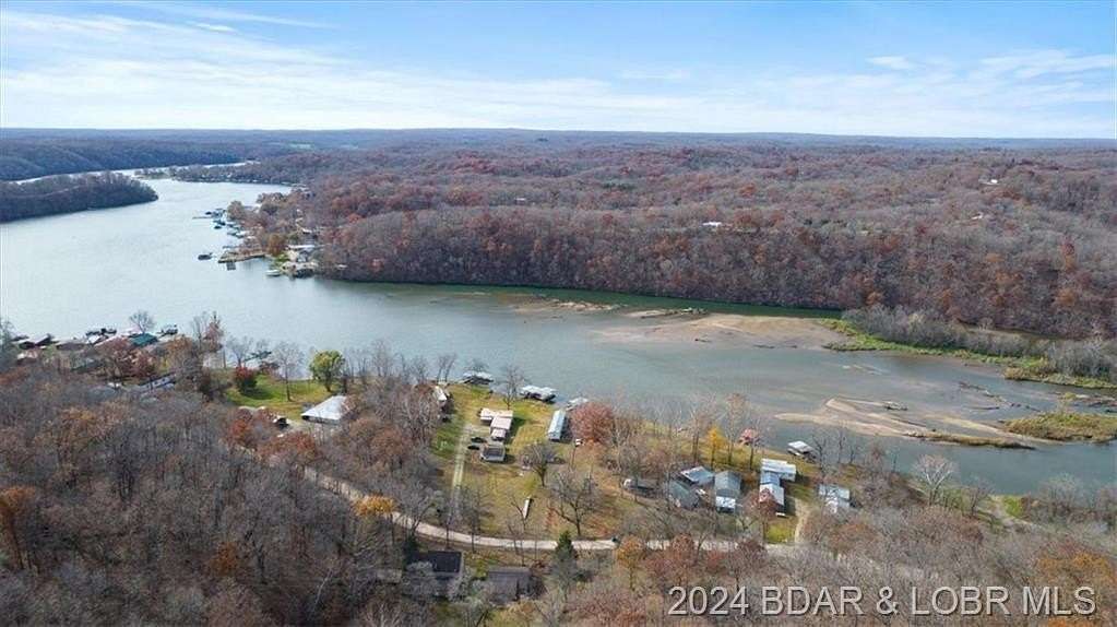 15.05 Acres of Recreational Land with Home for Sale in Versailles, Missouri