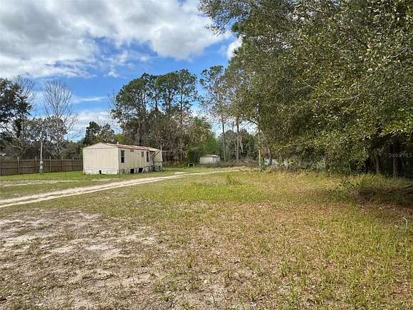 3 Acres of Residential Land with Home for Sale in Ocklawaha, Florida
