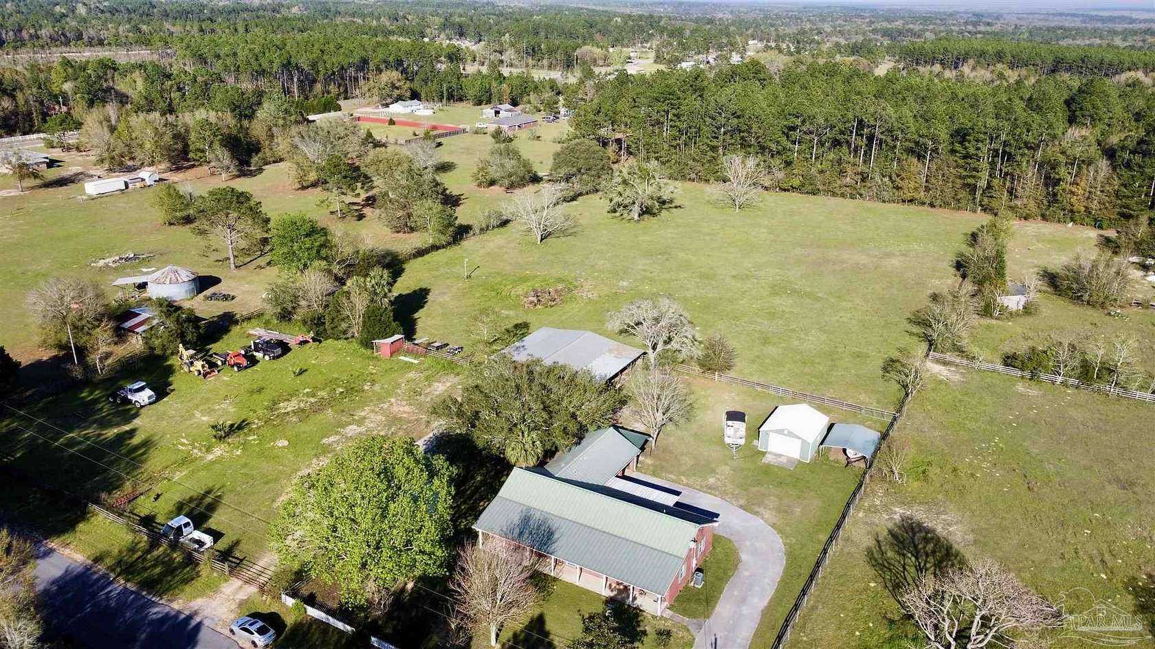 4.8 Acres of Residential Land with Home for Sale in Milton, Florida
