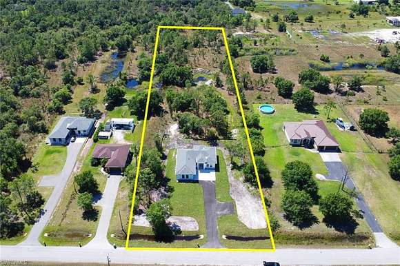 2.3 Acres of Residential Land with Home for Sale in Naples, Florida