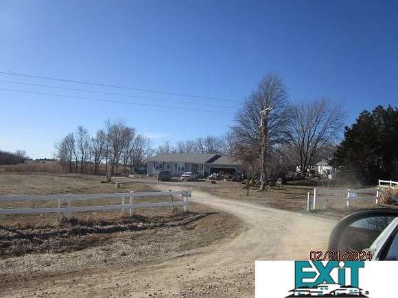 6.6 Acres of Residential Land with Home for Auction in Hickman, Nebraska