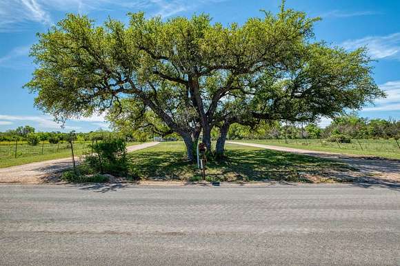 12.8 Acres of Land with Home for Sale in Bertram, Texas