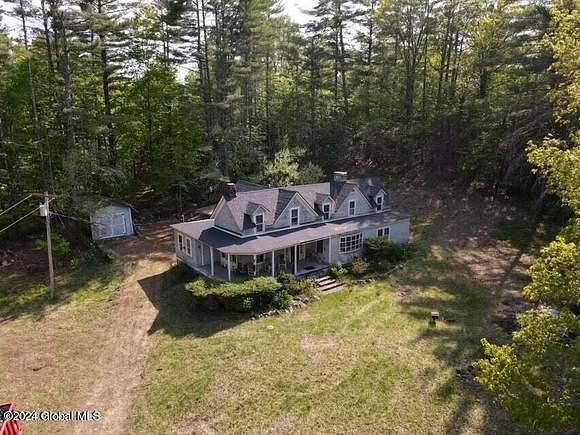 76 Acres of Land with Home for Sale in Pottersville, New York
