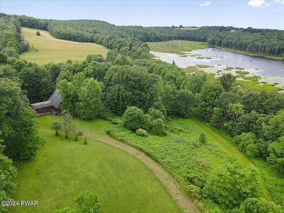 44.8 Acres of Recreational Land with Home for Sale in Thompson, Pennsylvania