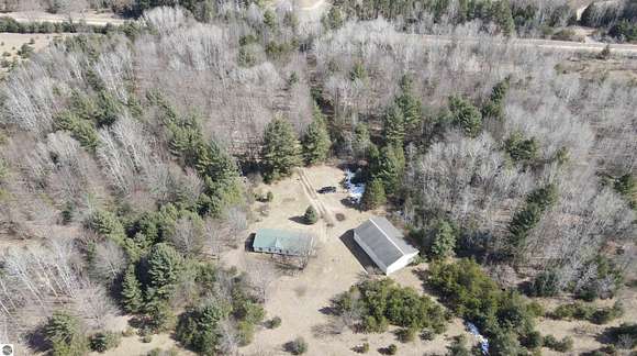 20 Acres of Recreational Land with Home for Sale in Kingsley, Michigan