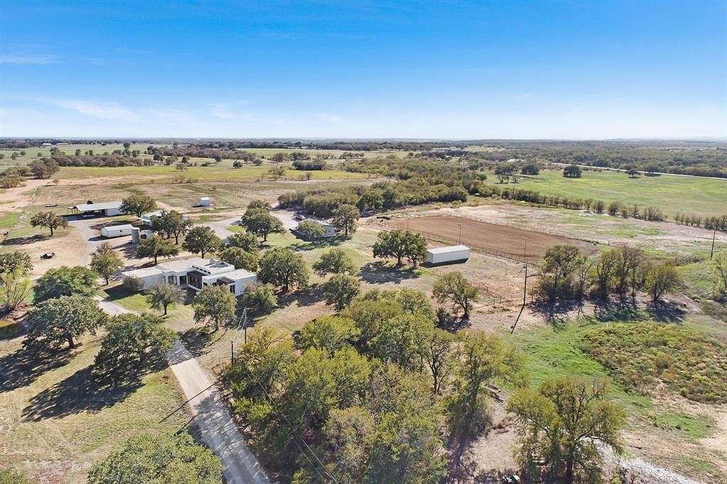 61.614 Acres of Agricultural Land with Home for Sale in Millsap, Texas