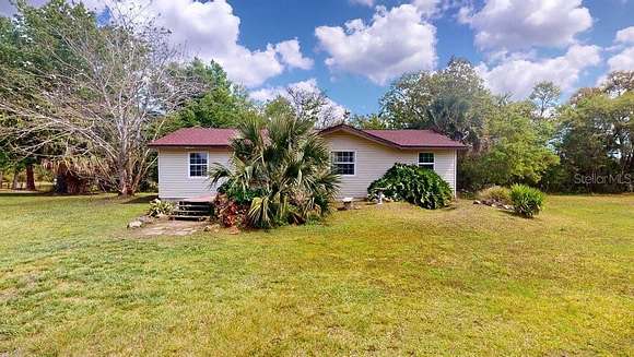 5.3 Acres of Residential Land with Home for Sale in Ormond Beach, Florida