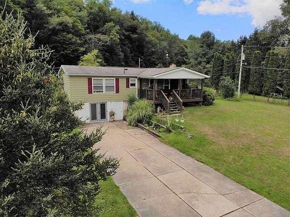 15.9 Acres of Land with Home for Sale in Coudersport, Pennsylvania