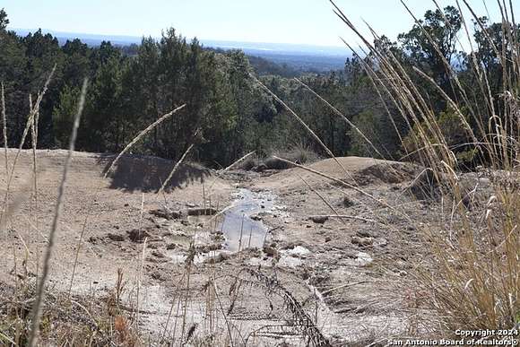 129.684 Acres of Agricultural Land with Home for Sale in Marble Falls, Texas