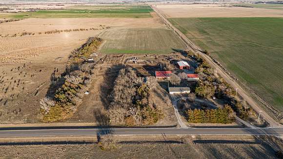 9.5 Acres of Land with Home for Auction in Lyons, Kansas