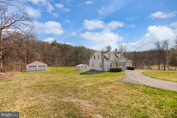 12.9 Acres of Land with Home for Auction in Millerstown, Pennsylvania