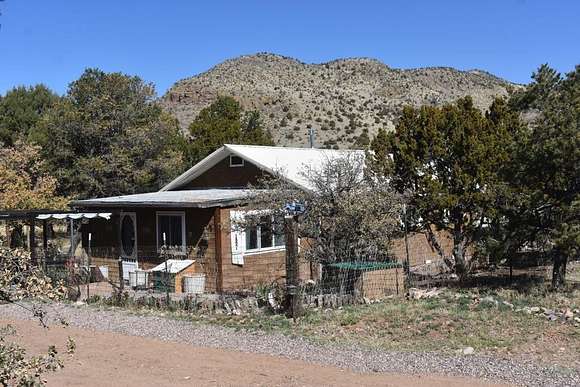 2.1 Acres of Residential Land with Home for Sale in Magdalena, New Mexico