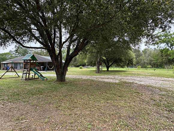 5 Acres of Land with Home for Sale in Kirbyville, Texas