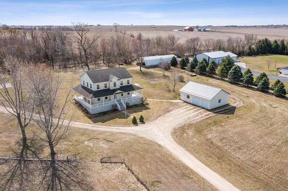 3.7 Acres of Residential Land with Home for Sale in Farley, Iowa