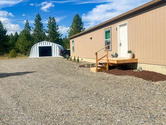 4.1 Acres of Residential Land with Home for Sale in Kettle Falls, Washington