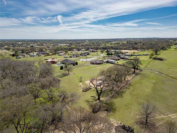 3.9 Acres of Residential Land with Home for Sale in Reno, Texas
