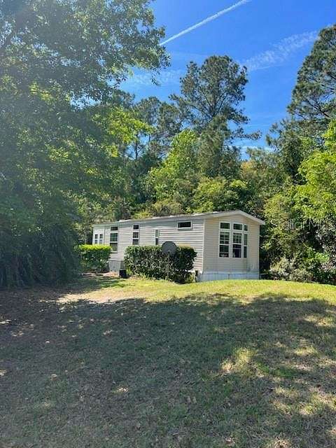 5.4 Acres of Residential Land with Home for Sale in Micanopy, Florida