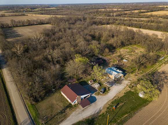 9.6 Acres of Land with Home for Sale in Baxter Springs, Kansas