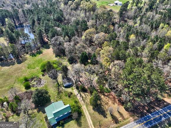 15.6 Acres of Land with Home for Sale in Good Hope, Georgia