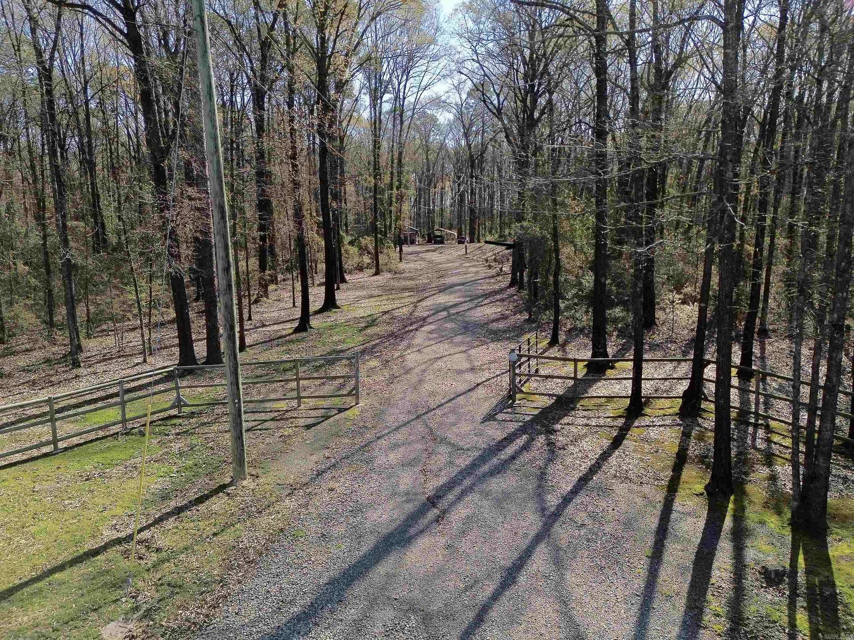 13.3 Acres of Land with Home for Sale in Perry, Arkansas