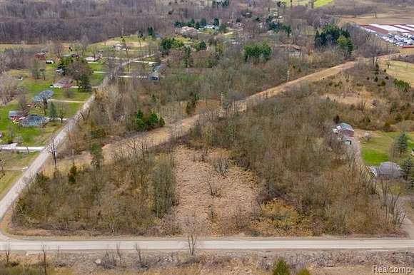 11.4 Acres of Recreational Land with Home for Sale in Fenton, Michigan