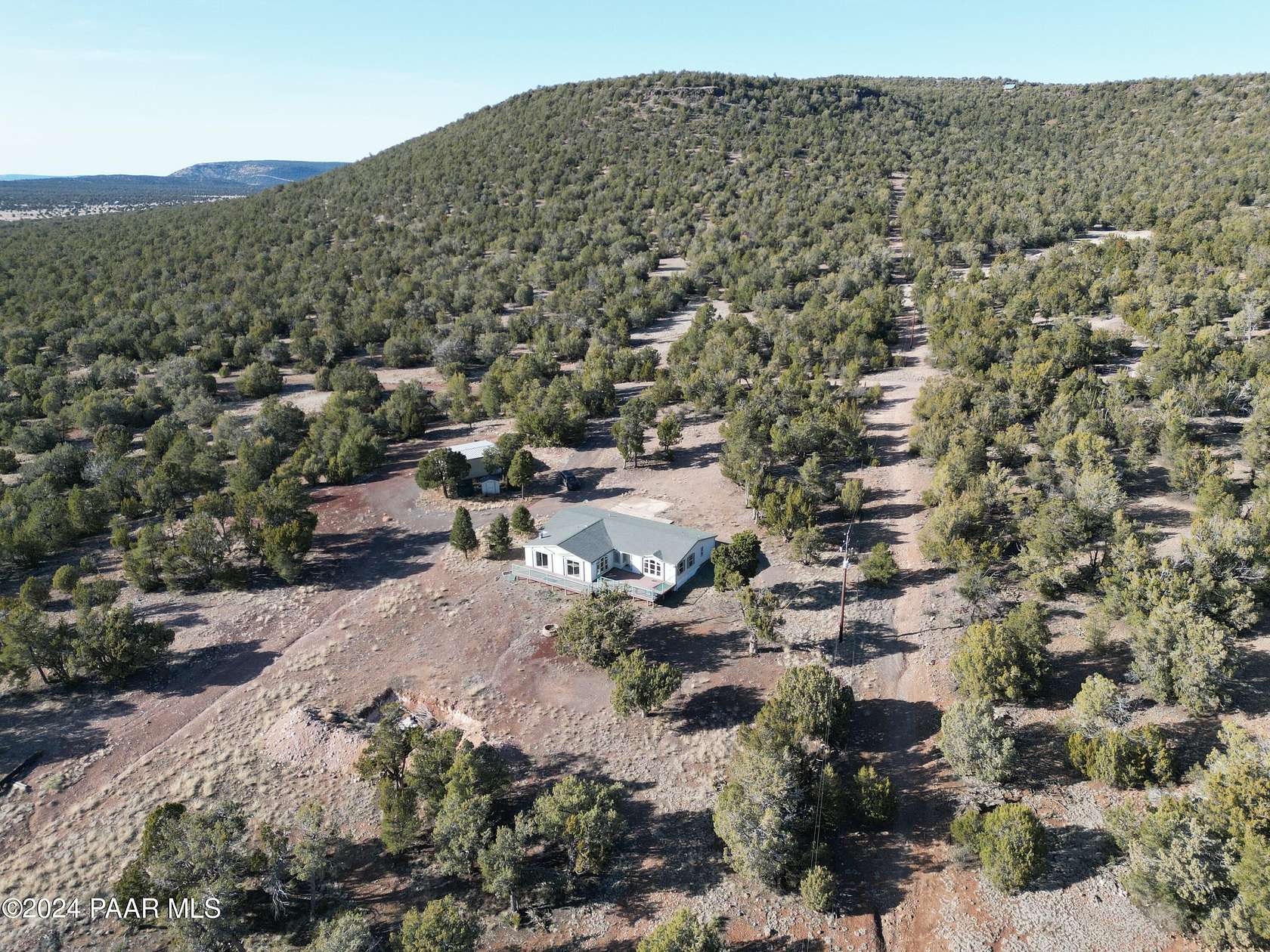 5.2 Acres of Residential Land with Home for Sale in Seligman, Arizona