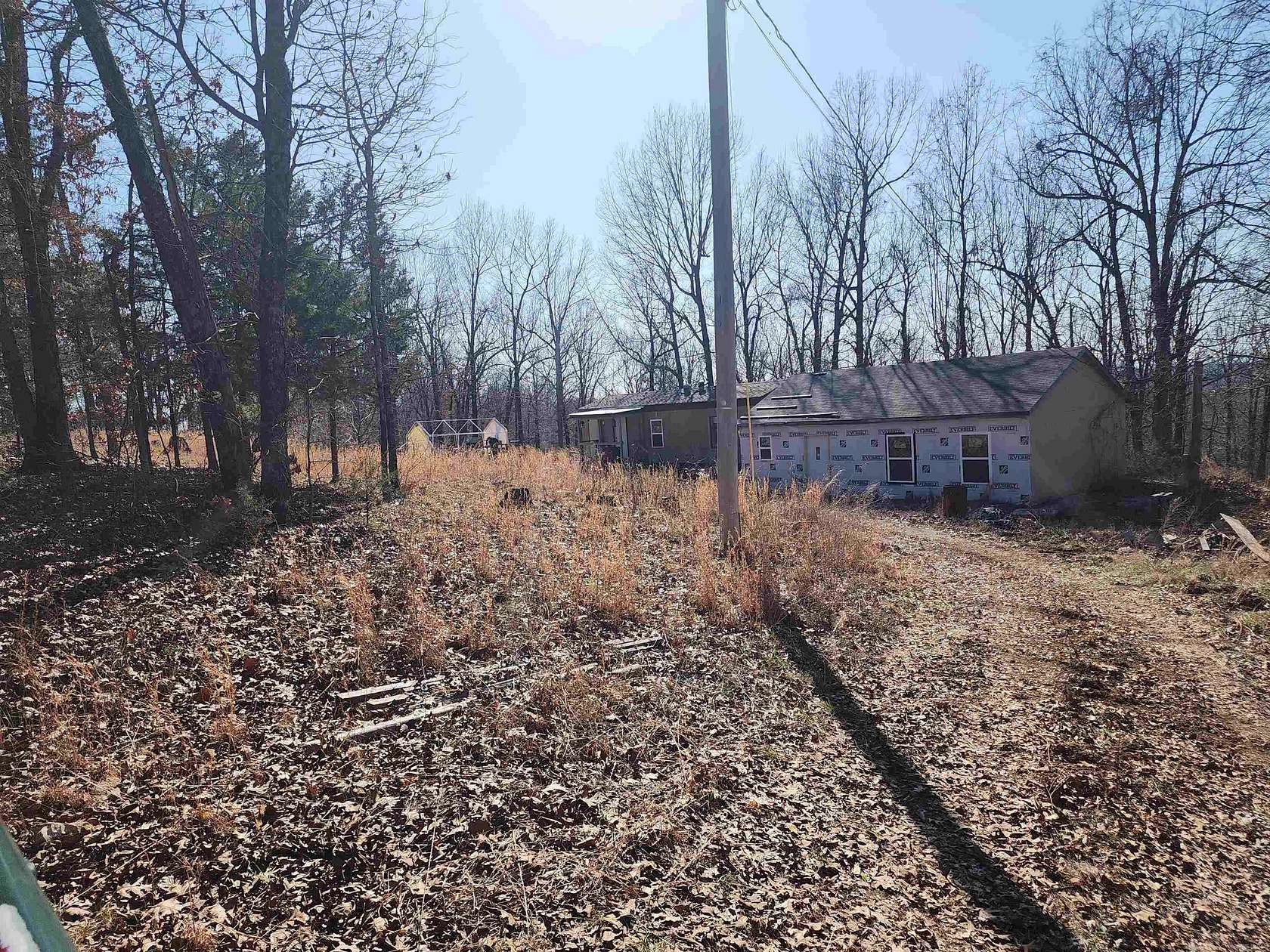 10 Acres of Residential Land with Home for Sale in Marion County Township, Arkansas