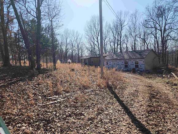 10 Acres of Residential Land with Home for Sale in Marion County Township, Arkansas
