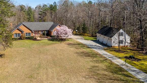 10.7 Acres of Land with Home for Sale in Powhatan, Virginia
