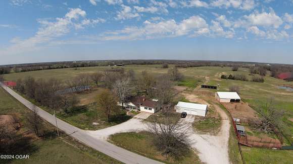 65 Acres of Agricultural Land with Home for Sale in Wentworth, Missouri