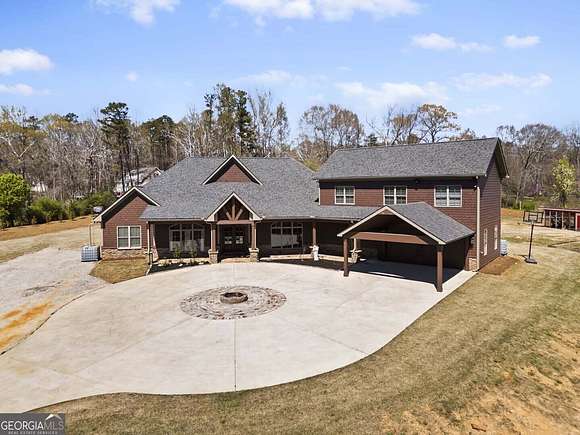 14.6 Acres of Land with Home for Sale in Braselton, Georgia