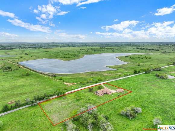 2 Acres of Residential Land with Home for Sale in Luling, Texas