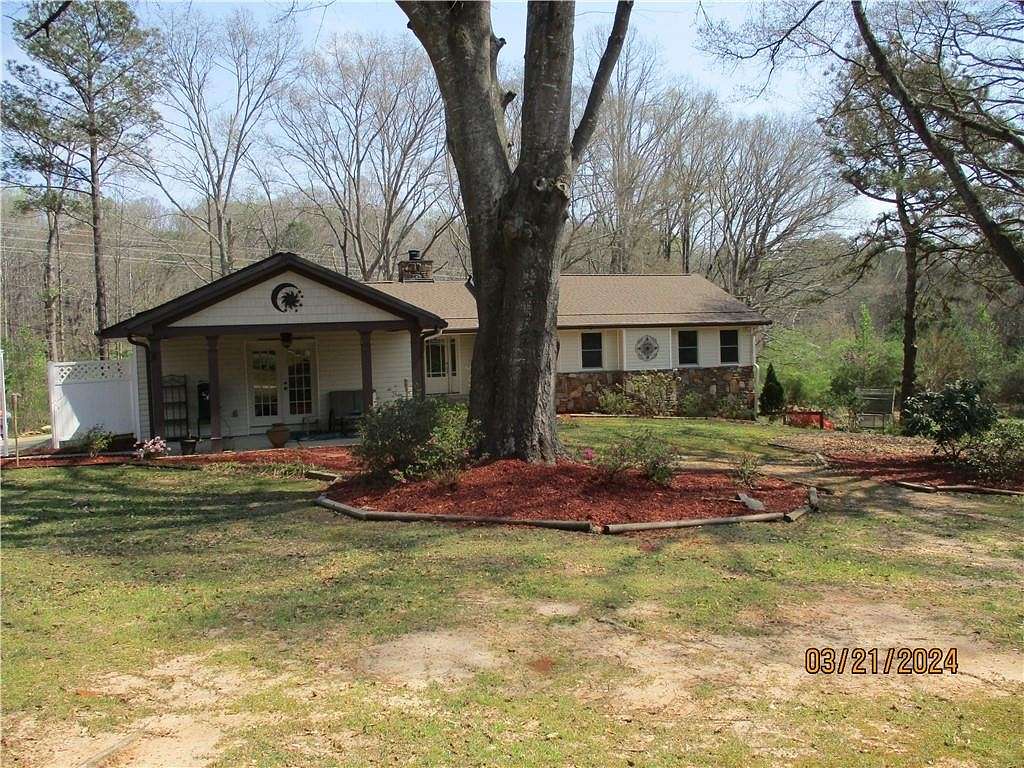 2.4 Acres of Residential Land with Home for Sale in Lilburn, Georgia