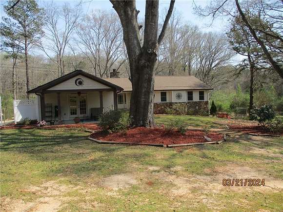 2.4 Acres of Residential Land with Home for Sale in Lilburn, Georgia
