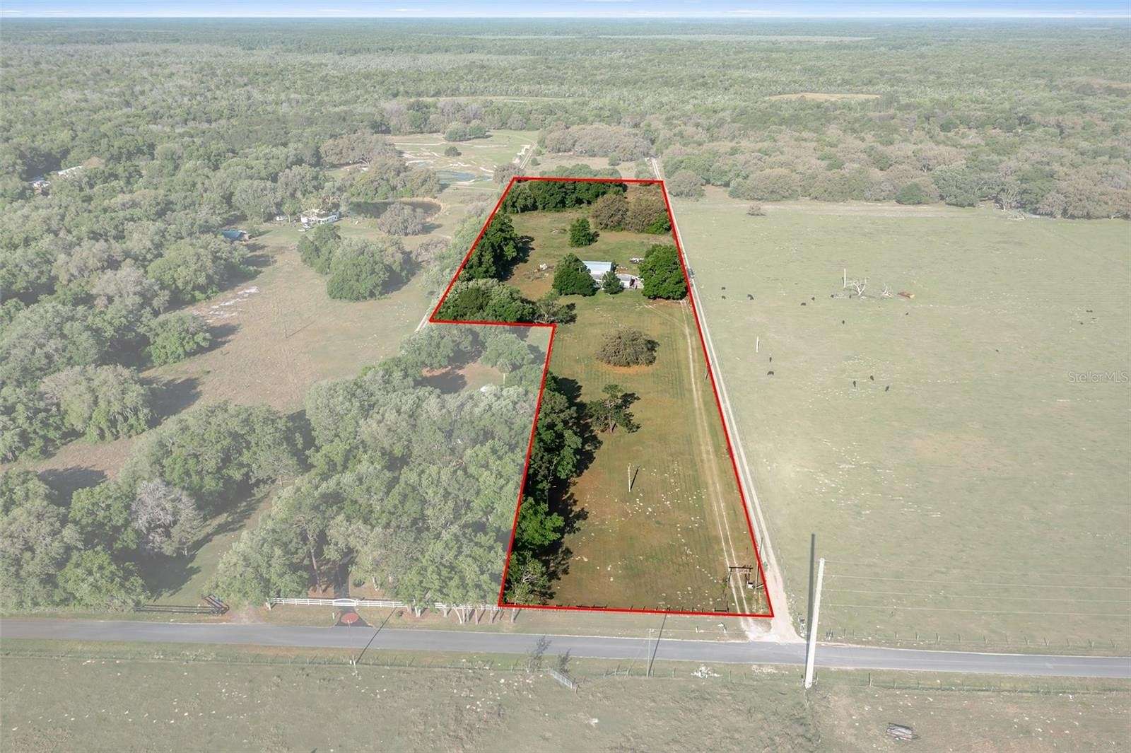 9 Acres of Residential Land with Home for Sale in Lake Panasoffkee, Florida
