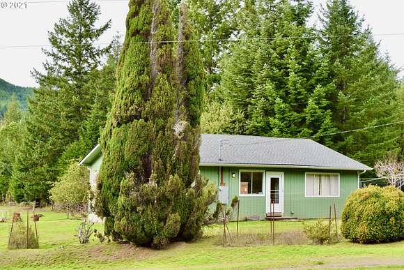 4.6 Acres of Residential Land with Home for Sale in Gold Beach, Oregon