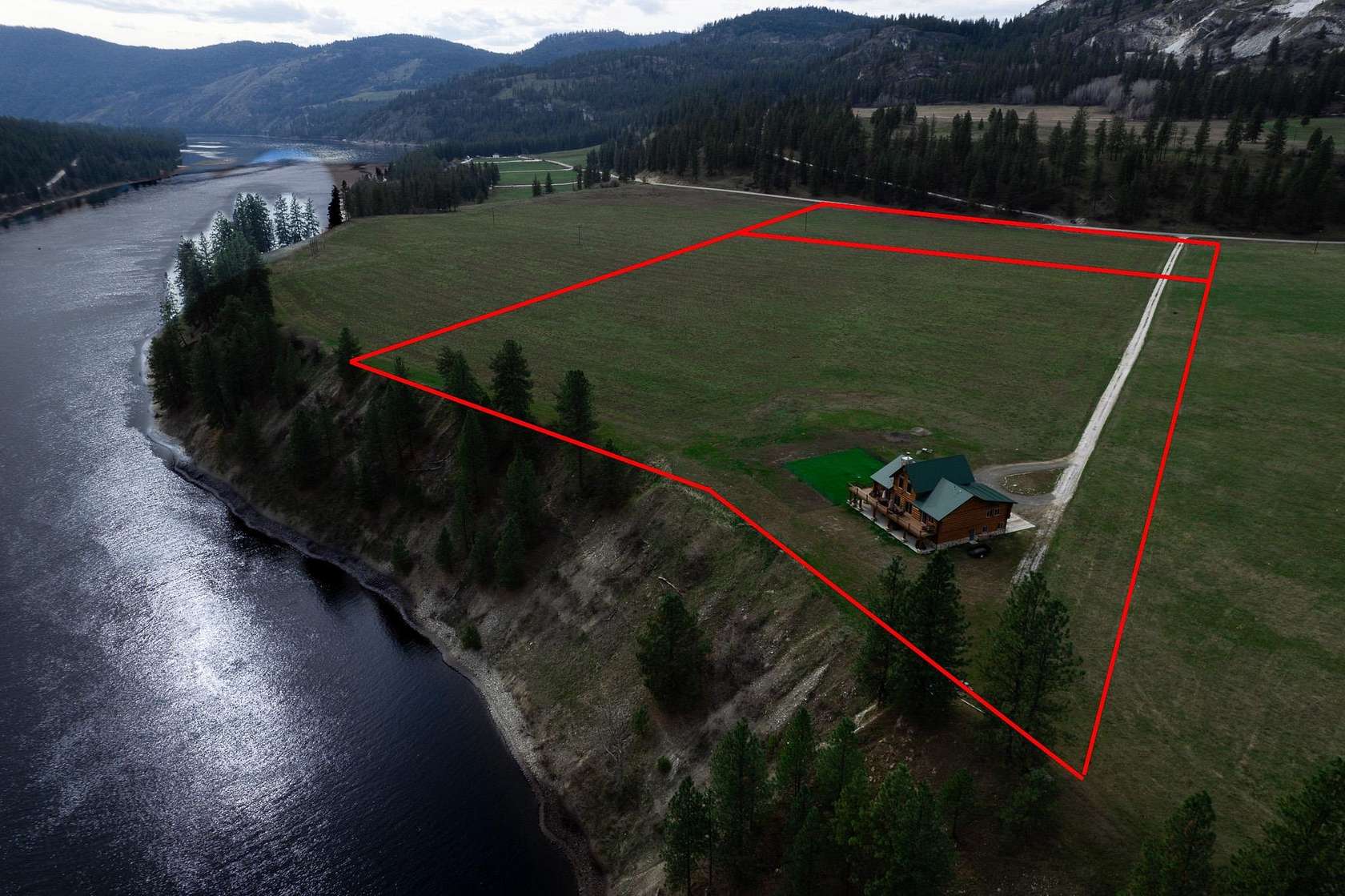 21 Acres of Recreational Land with Home for Sale in Kettle Falls, Washington