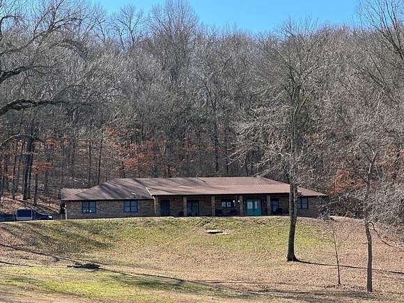 38.3 Acres of Agricultural Land with Home for Sale in Eureka Springs, Arkansas