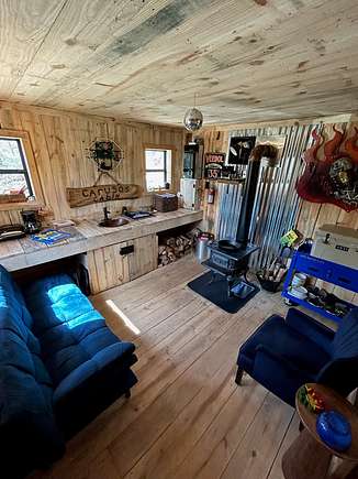 Inside of cabin with wood burning stove