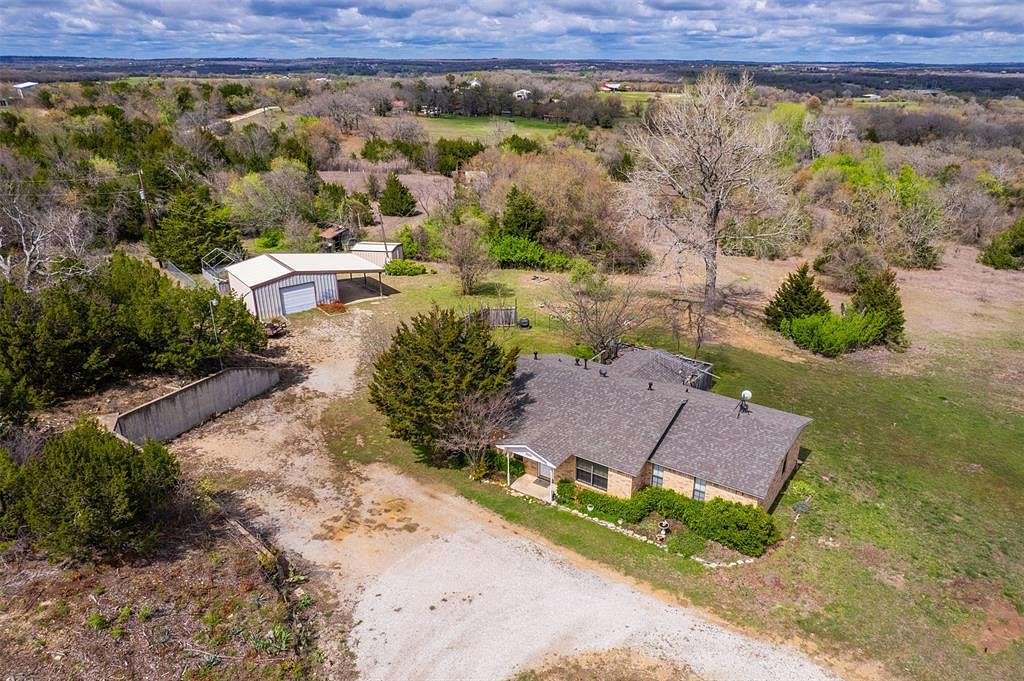 10 Acres of Residential Land with Home for Sale in Weatherford, Texas