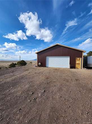 8.2 Acres of Residential Land with Home for Sale in Fort Garland, Colorado