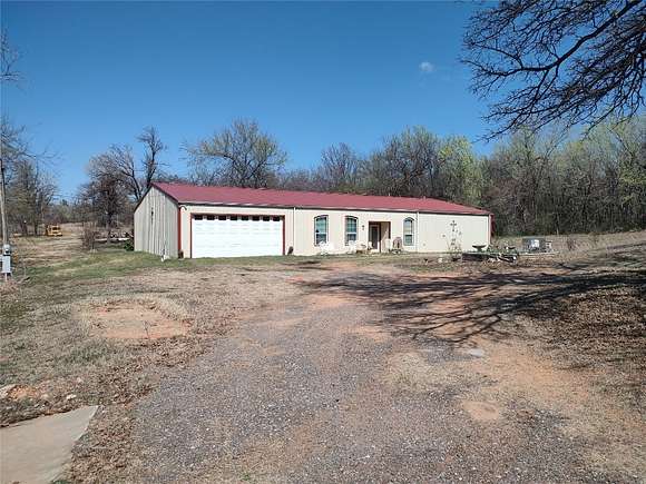 5.6 Acres of Residential Land with Home for Auction in Choctaw, Oklahoma
