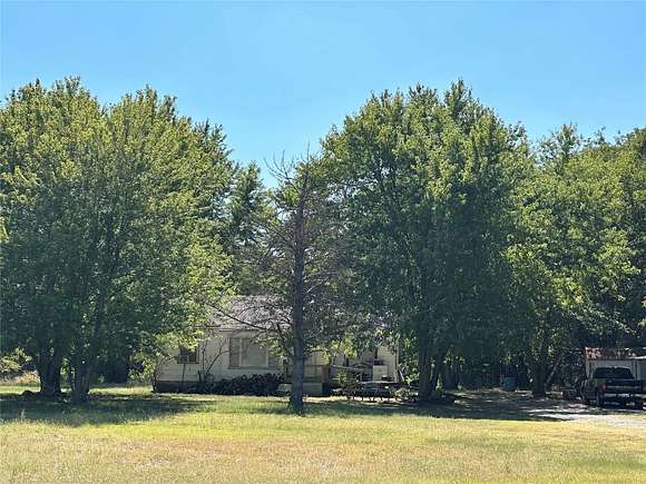 16.8 Acres of Land with Home for Sale in Fairfax, Oklahoma