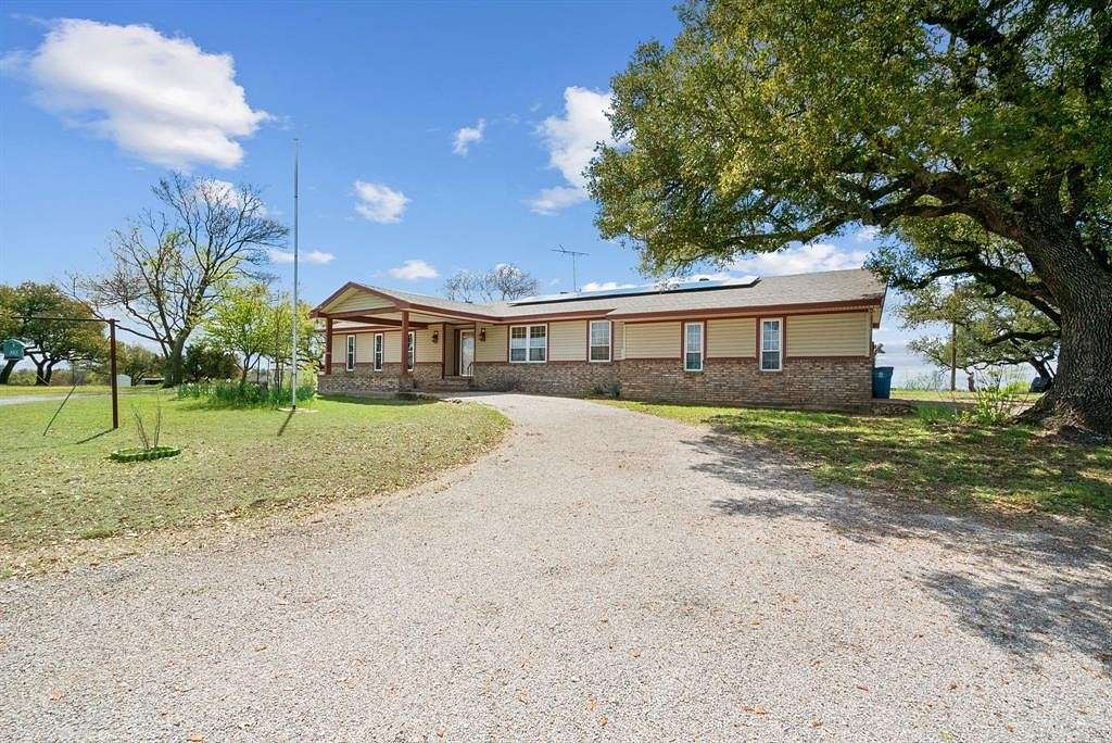 6 Acres of Land with Home for Sale in Poolville, Texas