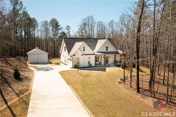 10 Acres of Residential Land with Home for Sale in Colbert, Georgia