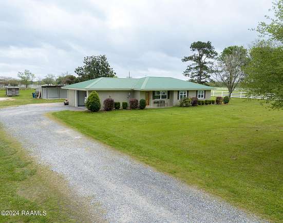 2.3 Acres of Residential Land with Home for Sale in Jennings, Louisiana