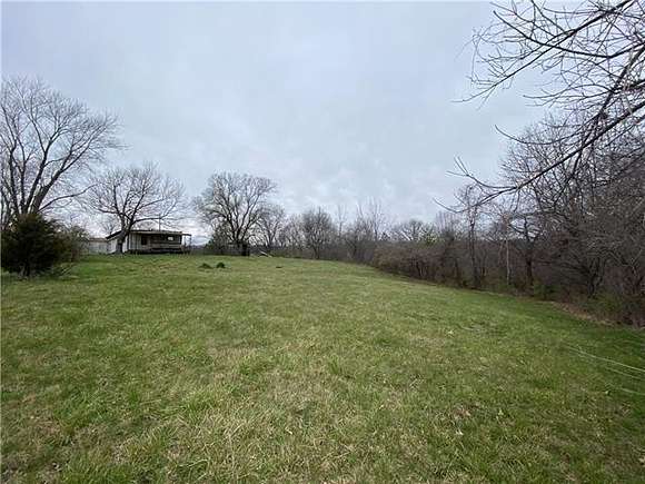 3.8 Acres of Residential Land with Home for Sale in Excelsior Springs, Missouri